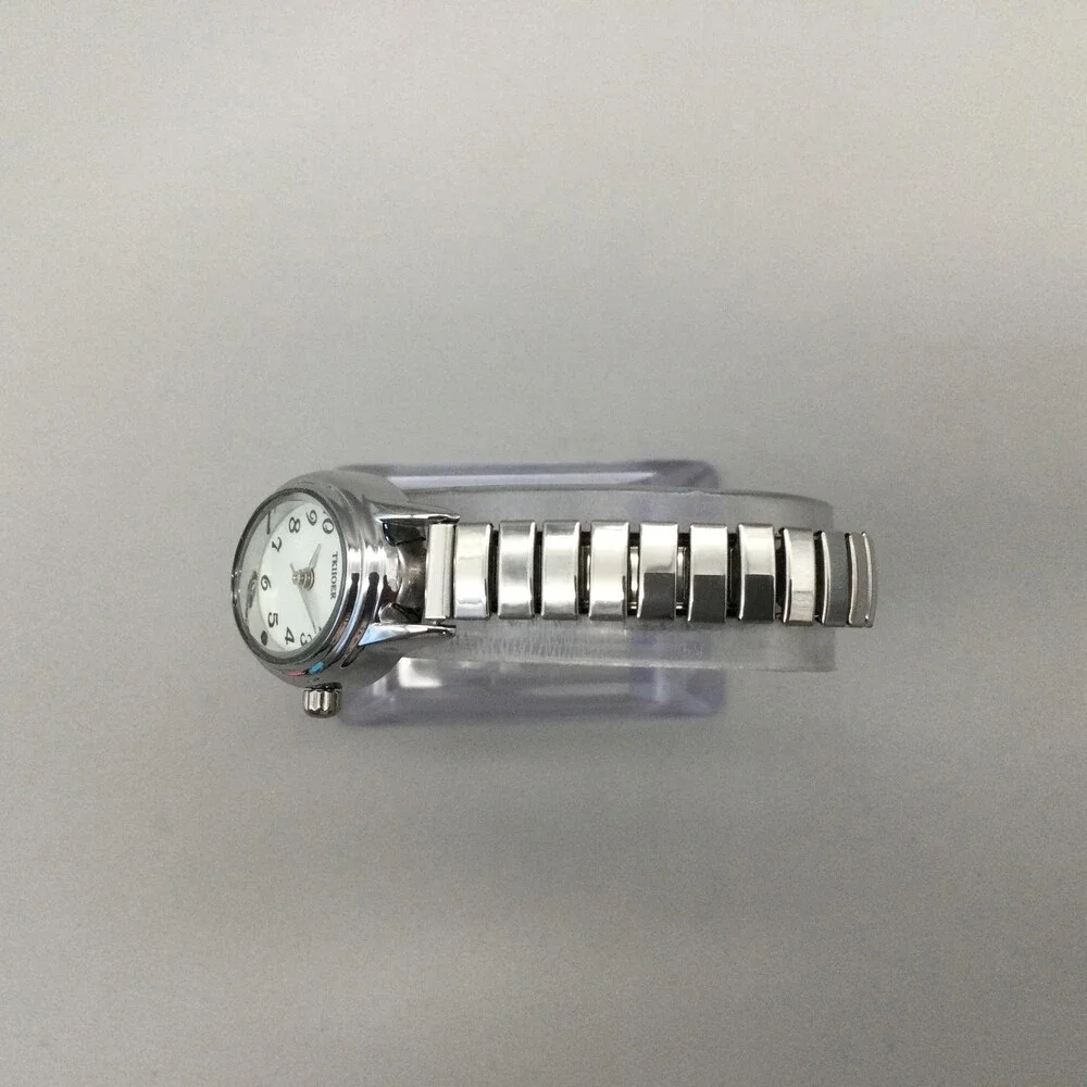 TKIIOER Womens Watch 19mm Silver Tone White Oval Dial Stretch Band New Battery